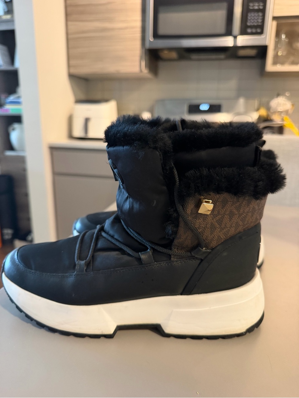 Michael Kors Black Faux-Fur Platform Winter Boots with Brown Logo Panel